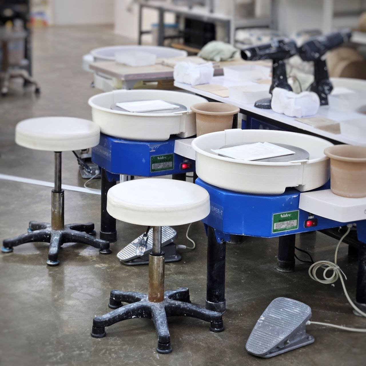 Work independently on the wheels at Urth & Phire Ceramic Studio during open studio session in Singapore