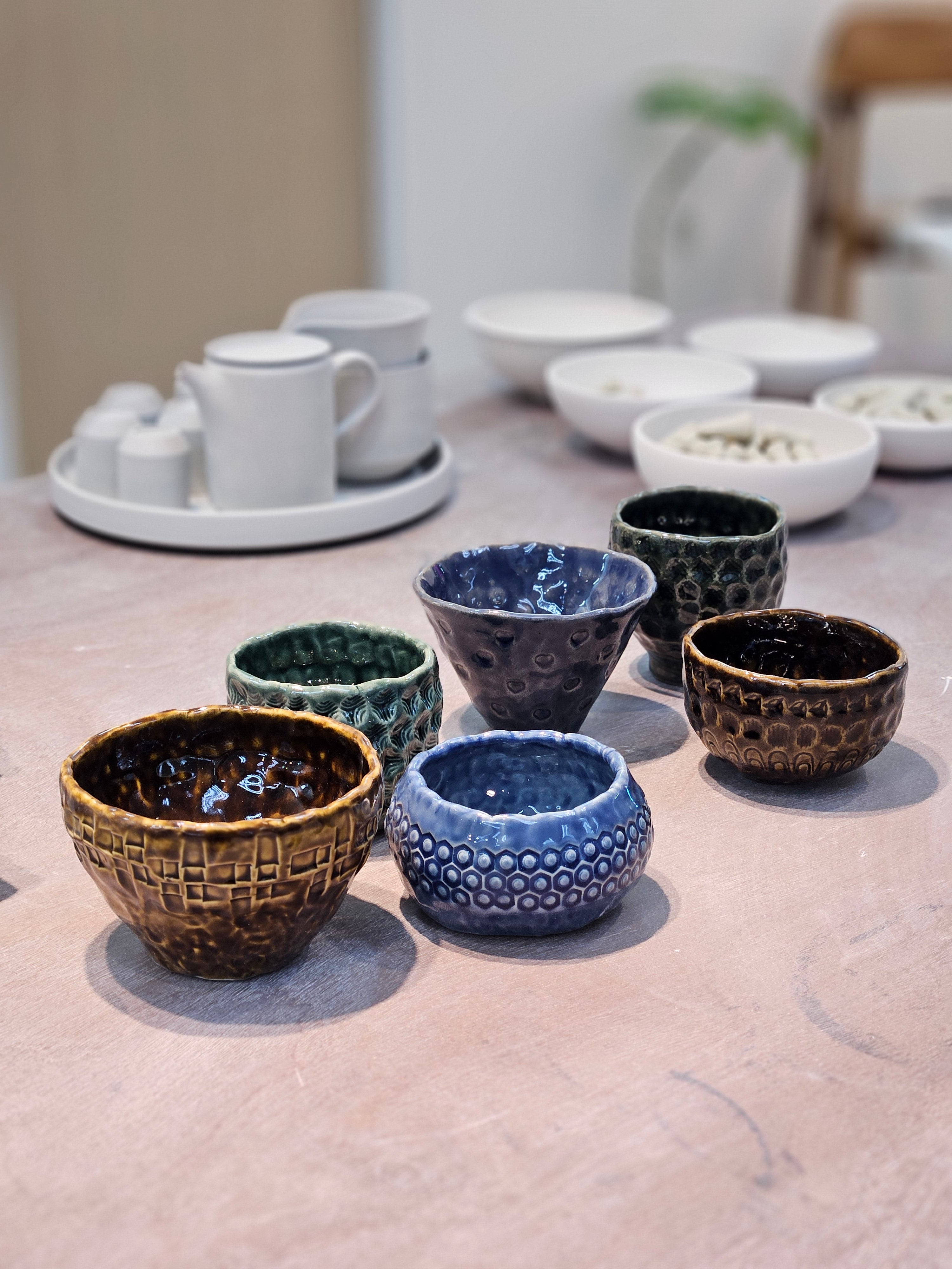 Metropolitan YMCA pottery finished pieces from Urth & Phire Ceramic Studio