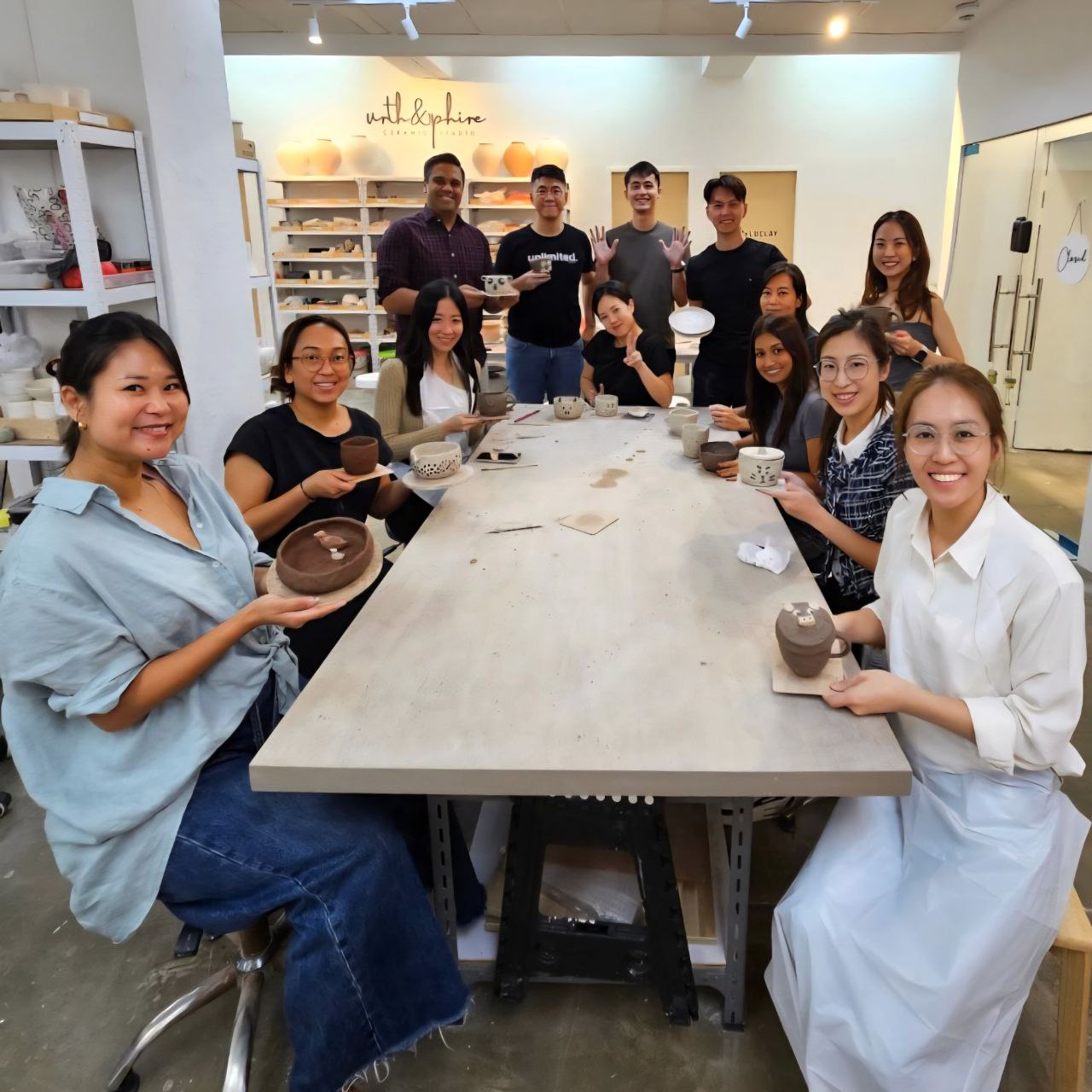From mugs to lidded jars, the Workday Singapore team dove into the full pottery experience at Urth & Phire Ceramic Studio